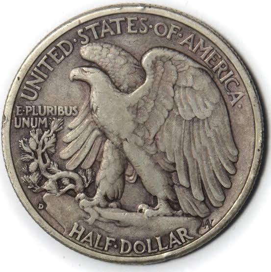 Close-up of 1938-D Walking Liberty Half Dollar reverse showing the D mint mark below the eagle's tail feathers
