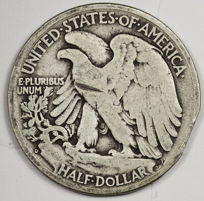 1938 Walking Liberty Half Dollar clipped planchet error showing a curved concave section missing from the coin's rim